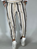 Pantalones a rayas color beige con efecto lino