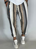 Pantalones a rayas efecto lino color camel