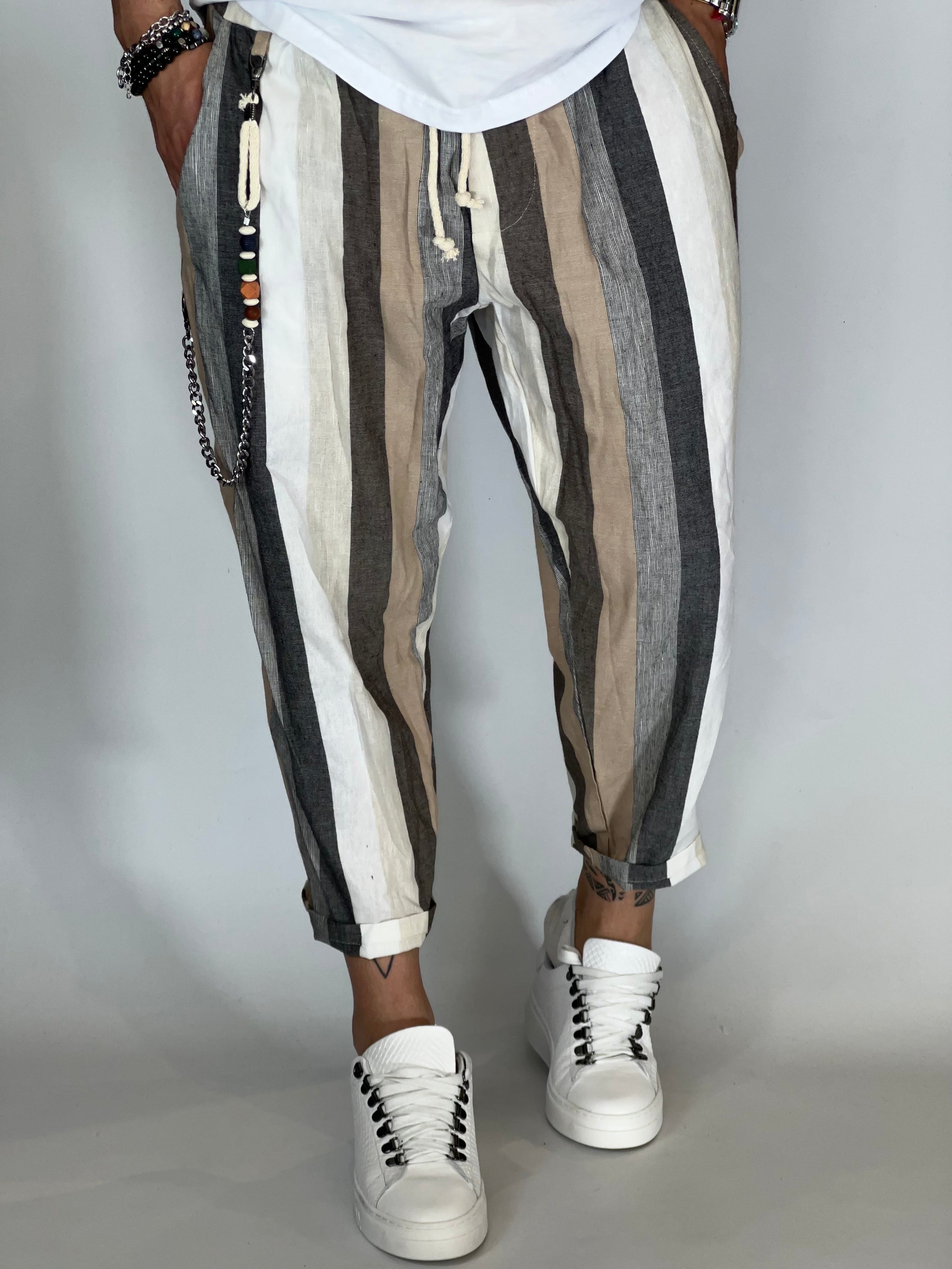 Pantalones a rayas efecto lino color camel