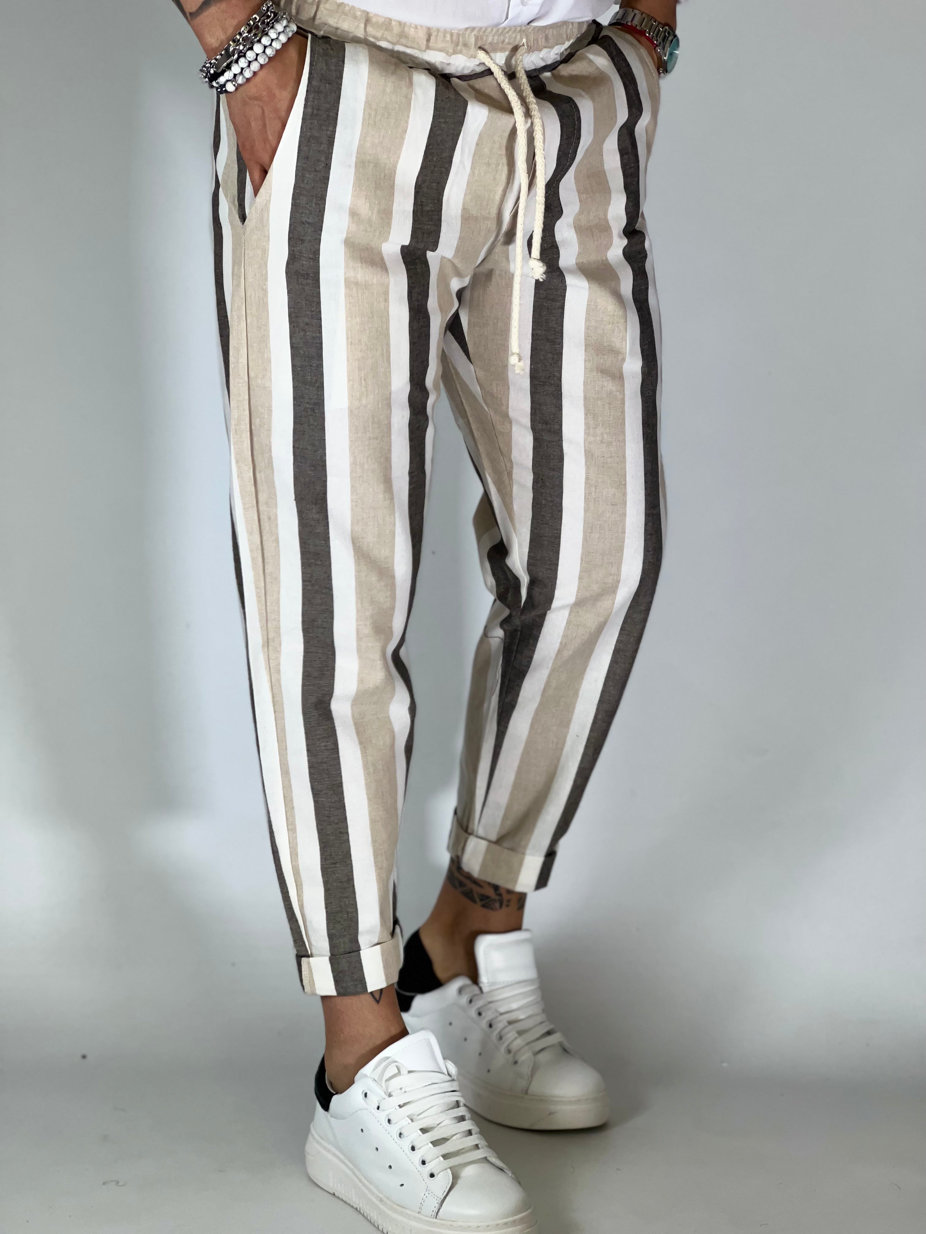 Pantalones a rayas color beige con efecto lino
