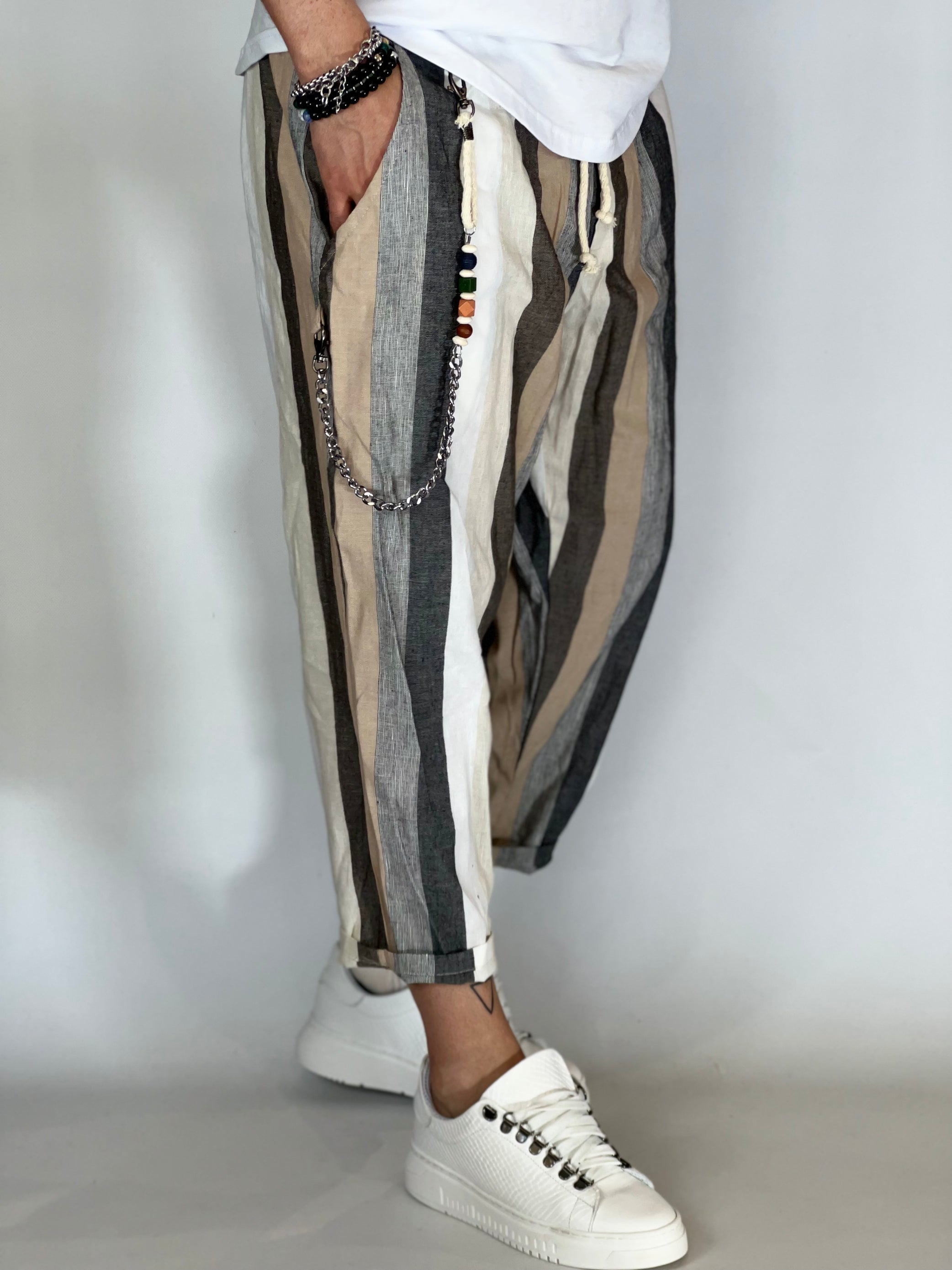 Pantalones a rayas efecto lino color camel